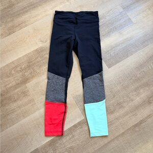 Lululemon Pedal To The Medal 7/8 Tight
Black / Alarming / Tranquil Blue